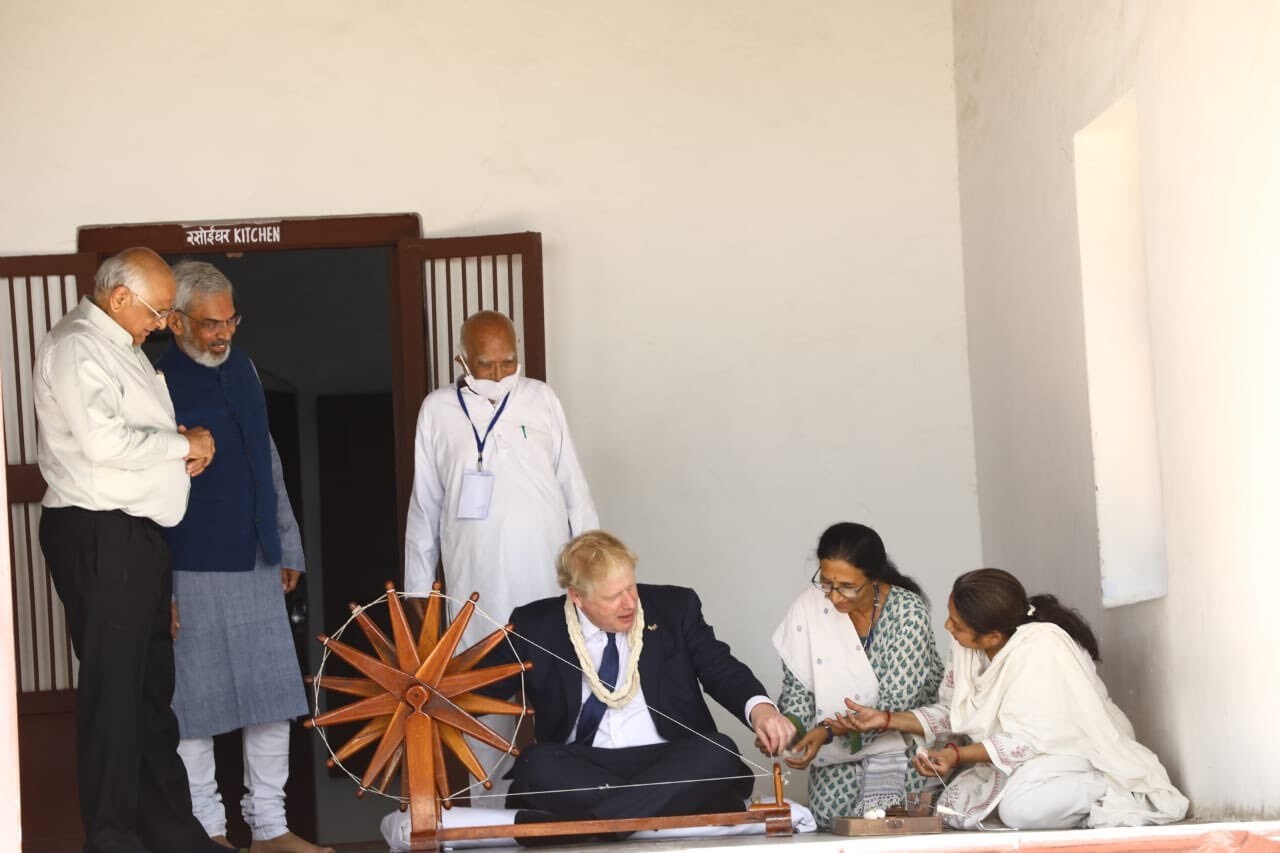 Spinning Charkha in Sabarmati Ashram, this message was written about Bapu