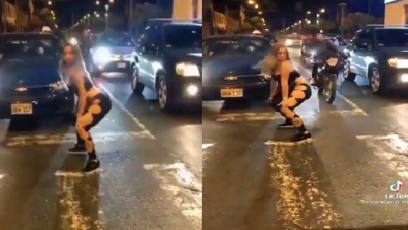 The woman was dancing by stopping the traffic, this person got angry, the video went viral