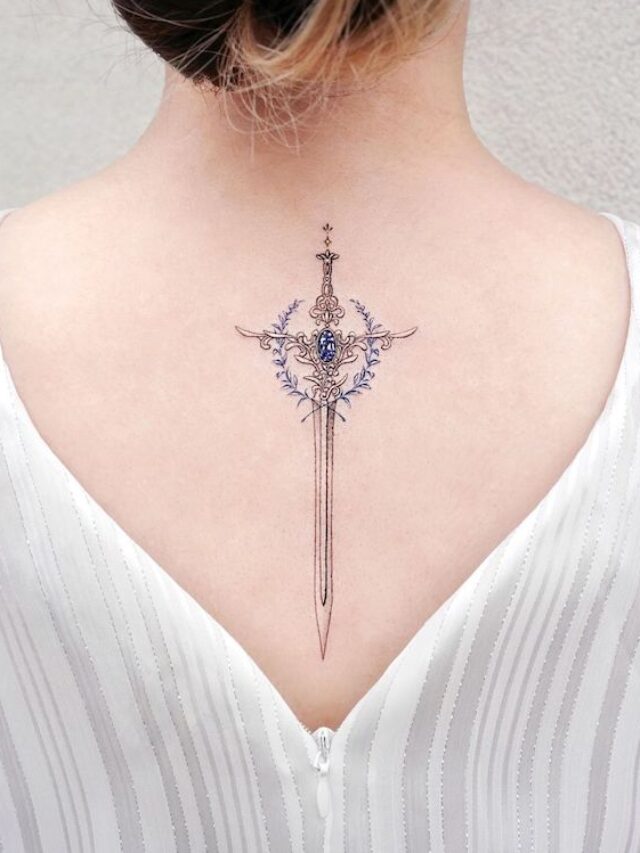 Gemstone-sword-on-the-back-by-@tattooist_solar