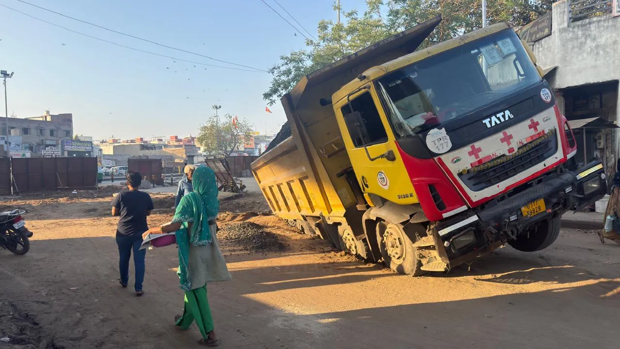 AMC Dumper Stuck in Pothole